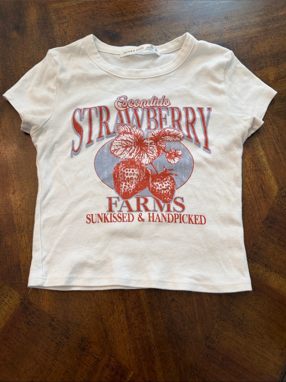 Altar'd State White Crop Tee with Red & Blue Strawberry Graphic